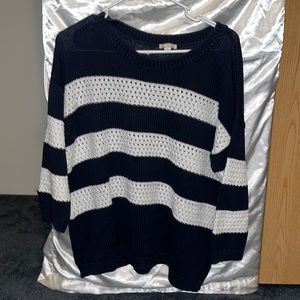 I’m selling a Gap sweater that is crocheted. Dark blue and white, size large.